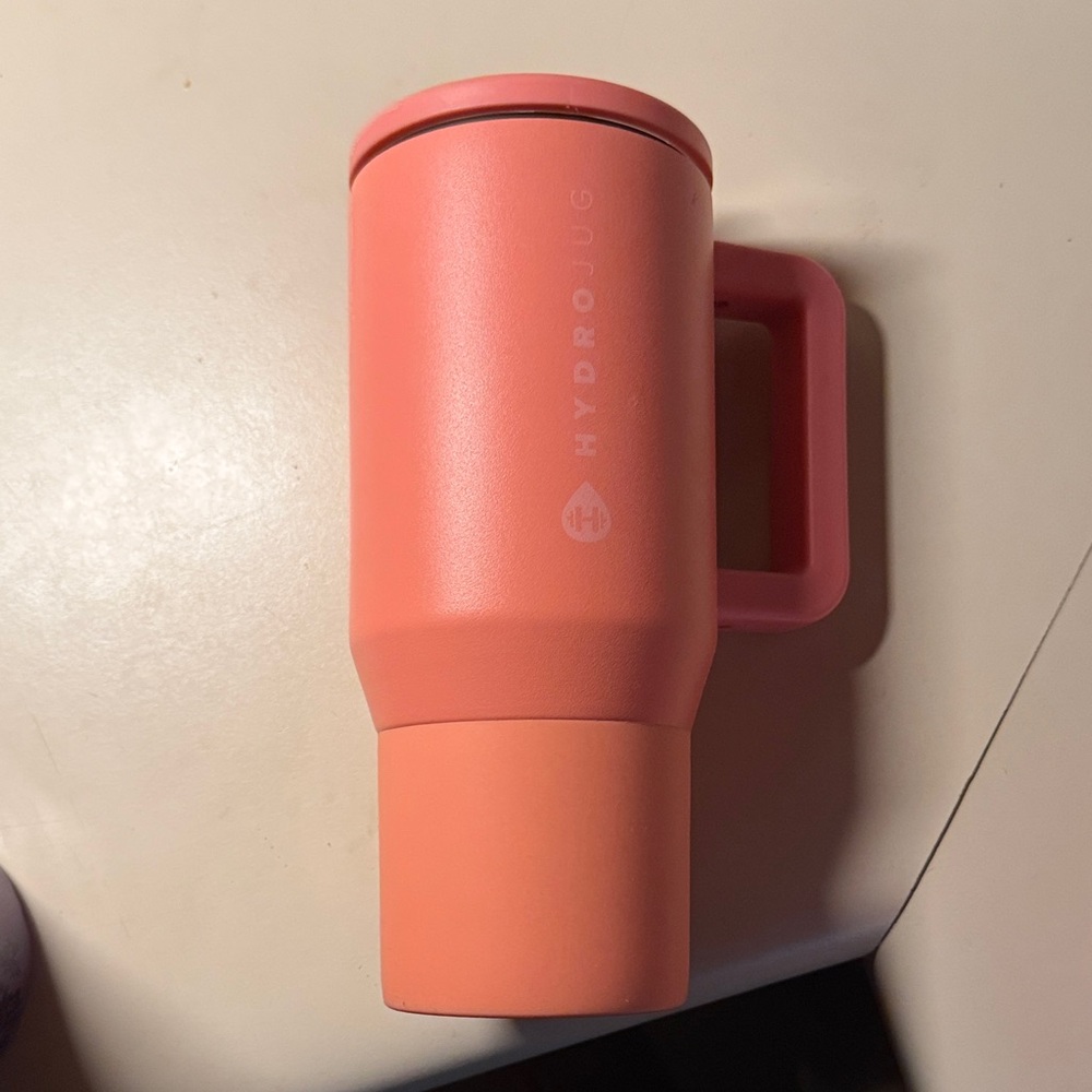 HydroJug Coral Insulated tumbler in summer peach